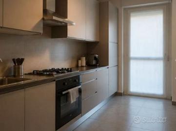 Elegante trilocale in contesto residenziale