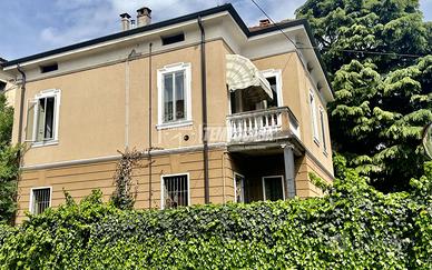 Villa plurifamiliare (locata) con giardino e posto