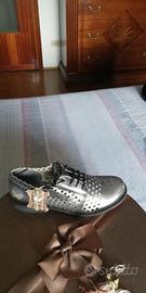 Scarpe felmini traforata grigio 