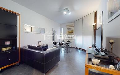 Bilocale con terrazzo, cantina e posto auto copert