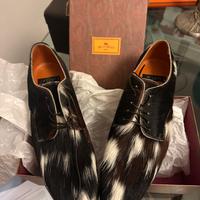 Etro, scarpe mai usate in cavallino