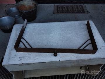 cornice per contenere cenere caminetto