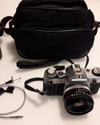 N. 2 Macchine fotografiche Canon AE - 1 accessori