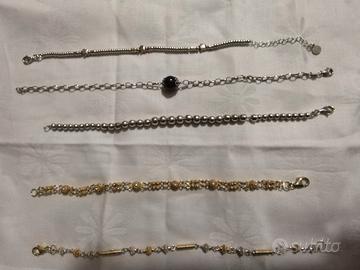 5 bracciali  orecchini 3 pendenti in argento