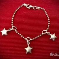 Braccialetto bambina/o con tre ciondoli a stella