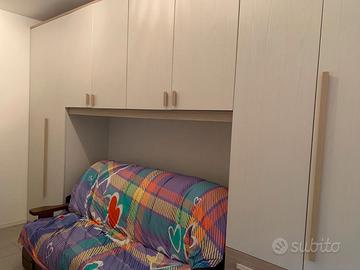 Armadio a ponte + divano letto matrimoniale