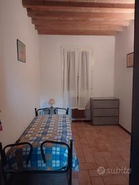 Stanza singola con uso bagno al piano
