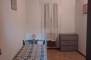 Stanza singola con uso bagno al piano