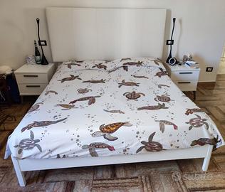 letto matrimoniale con testiera ecopelle