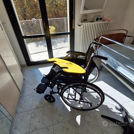 carrozzina per disabili  pieghevole