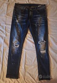 Jeans blu scuro effetto destroyed