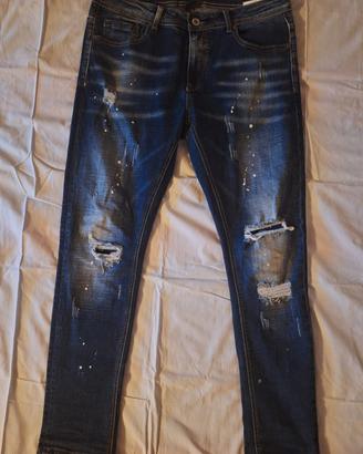 Jeans blu scuro effetto destroyed