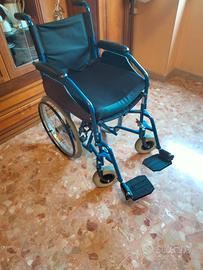 Sedia a rotelle come nuova 