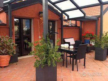 Mansarda con 65 mq di terrazzo