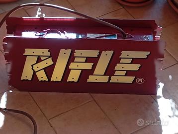 Insegna luminosa rifle