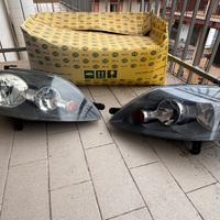 Coppia Fari VW Golf V Plus 2003-2008 Hella