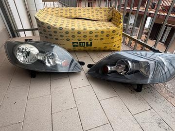 Coppia Fari VW Golf V Plus 2003-2008 Hella