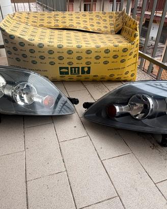 Coppia Fari VW Golf V Plus 2003-2008 Hella