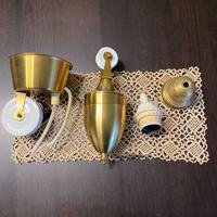 Saliscendi in ottone e ceramica