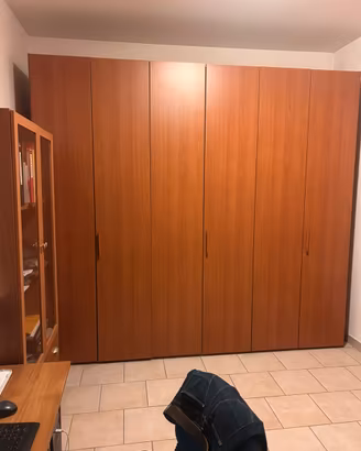 Armadio tre ante