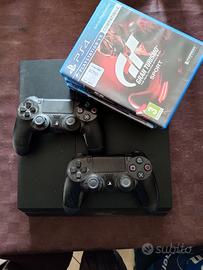 Consolle ps4 + 2 pad + 6 giochi