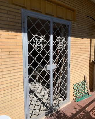 Grata per porta finestra in ferro