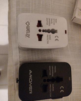 2 adattatori caricabatterie da viaggio US JAP UK..