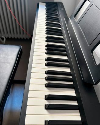 Pianoforte digitale + seggiolino + sacca