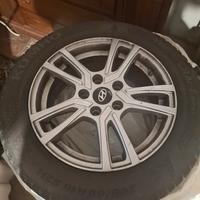 set pneumatici neve più cerchi 