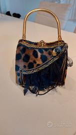 Clutch borsa gioiello in cavallino maculato 