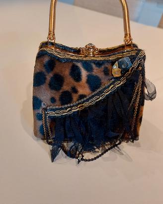 Clutch borsa gioiello in cavallino maculato 