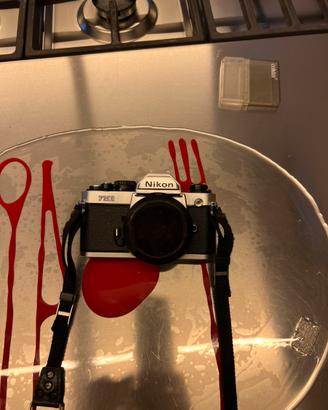 Fotocamera nikon fm2, ottiche valigetta e accesso