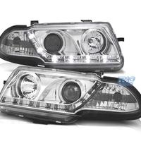 FARI OPEL ASTRA F 94-98 LUCE DIURNA LED FONDO CROM