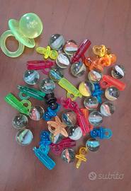 Ciucciotti biberon e biglie