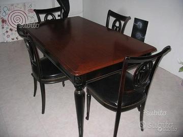 Tavolo Massello e poltrone in cuoio in Outlet