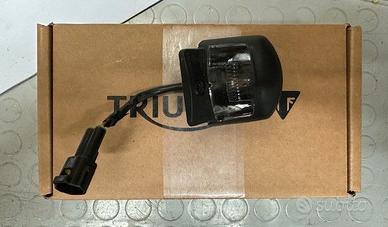 Luce targa Triumph