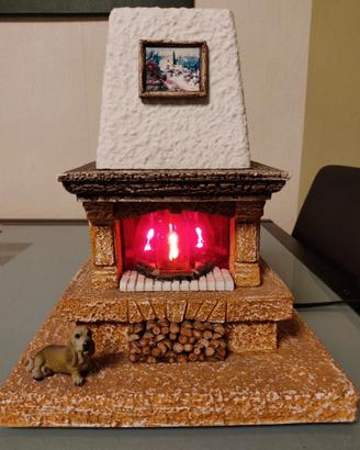CAMINETTO IN PIETRA CON FIAMMA 
