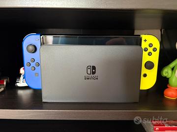 Nintendo Switch Oled + accessori + giochi