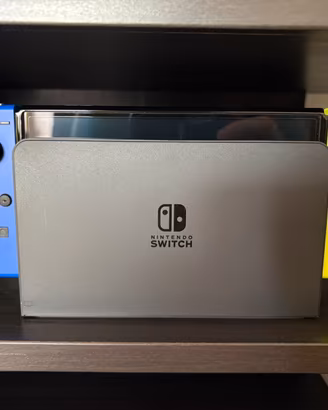 Nintendo Switch Oled + accessori + giochi