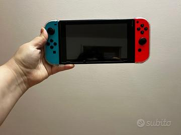 Nintendo Switch con giochi + accessori
