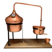 Alambicco in rame modello 2 litri su tavoletta