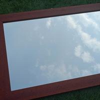 Specchio con cornice in legno