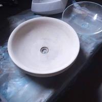 lavabo da appoggio in pietra