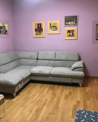 Divano angolare grigio poggiatesta regolabili