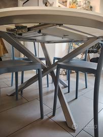 Tavolo tondo in cristallo allungabile