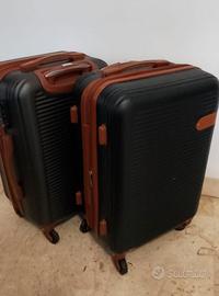 Trolley rigido 55x35x25 cm – 4 ruote – €25 cad.