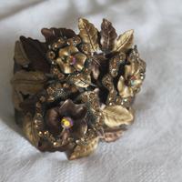 Braccialetto alto color ottone brunito con strass