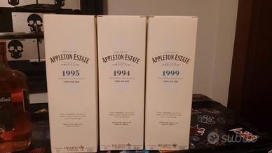 tre bottiglie di rum 