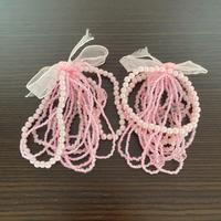 Bracciale perle rosa con fiore