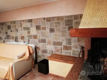 RIVESTIMENTO DI PIETRA RICOSTRUITA